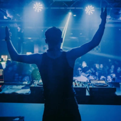 A DJ in front of the crowd